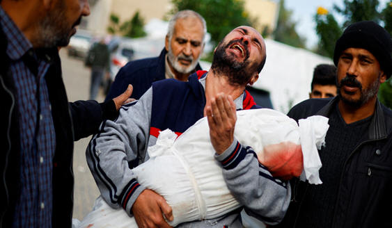 A Palestinian man grieving the loss of his child, who was killed by Israeli genocidal air strikes and bombardment on Gaza Strip, January 23, 2024 wafa